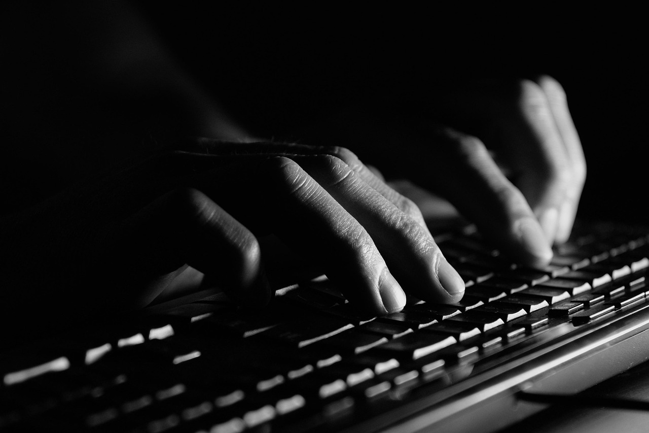 Person writing in notebook